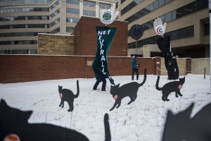 Supporters of net neutrality outside the Federal Communications Commission building in Washington in February. GABRIELLA DEMCZUK FOR THE NEW YORK TIMES