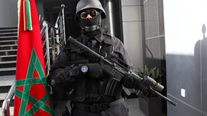 A Moroccan special anti-terror units poses in the new headquarters of the Central Bureau of Judicial Investigations in Sale, near Rabat, Morocco, Monday April 20, 2015. The Bureau was inaugurated earlier this year as part of the kingdom's beefed up war against terrorism. (AP Photo/Abdeljalil Bounhar)